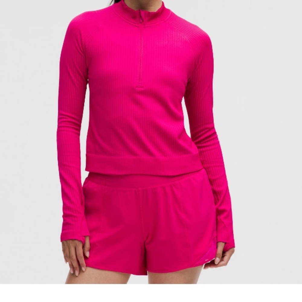 Lulu lemon Rest Less Cropped Half Zip
Colour Rib Passionate/Passionate
Size 12